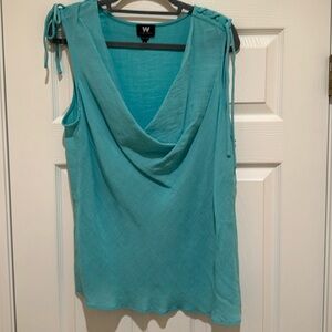 Aqua green sleeveless blouse.